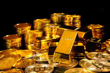 Gold bars and coins on black background 