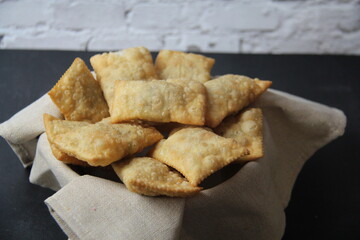 Brazilian food. Pastel, pastel in English, typical dish from the open markets of southeastern Brazil, fried and stuffed with meat. Mini pastries.