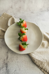 Strawberry organic fresh red fruit healthy white plate light background