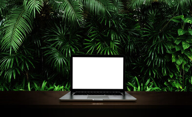 Modern laptop  isolated on green leaf background. 3D illustration.