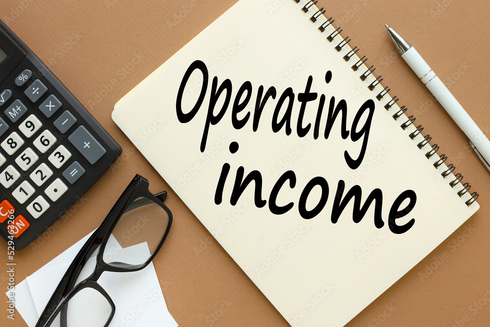 Poster open notepad with spring. near the calculator. text. net operating income . business and finance con