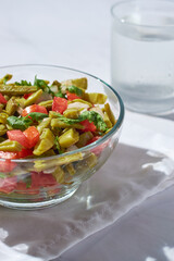 Traditional mexican nopal cactus salad or nopales a la mexicana. Vegan food.
