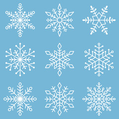 Vector set of white snowflakes on a blue background.
