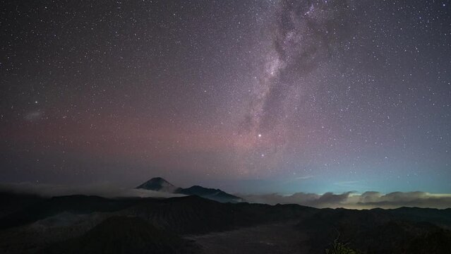 Beautiful milky way with starry orbit over active volcano bromo mountain in the night at Bromo Tengger Semeru National Park, East Java, Indonesia