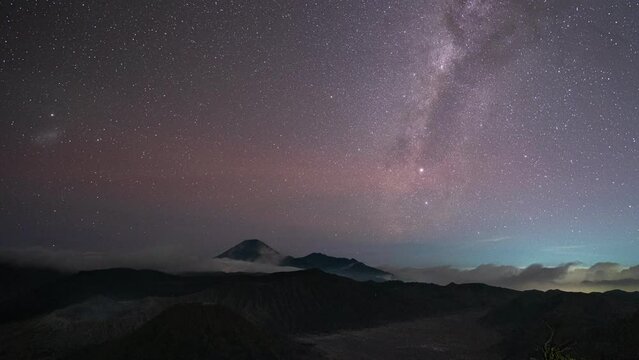 Beautiful milky way with starry orbit over active volcano bromo mountain in the night at Bromo Tengger Semeru National Park, East Java, Indonesia