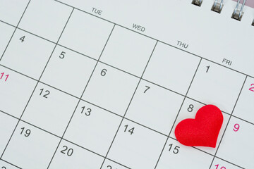Red heart shape on the date of the 8th day in the calendar.