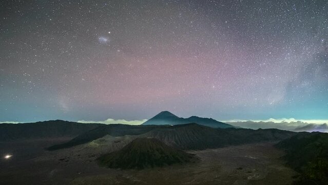 Beautiful milky way with starry orbit over active volcano bromo mountain in the night at Bromo Tengger Semeru National Park, East Java, Indonesia