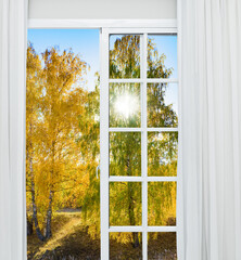 glass door autumn landscape