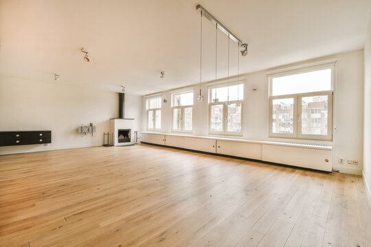 Empty large room with white walls and ceiling