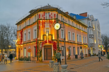 ZELENOGRADSK, RUSSIA - JANUARY 09, 2022: New Year's decorations on a pre-war building. Resort Avenue. Kaliningrad region
