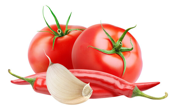 Arabbiata sauce ingredients (tomatoes, red chili peppers and garlic cut out
