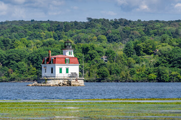 Fototapeta na wymiar 09/08/2022 - Town of Esopus, NY, Photo of the historic Esopus Meadows Lighthouse located on the Hudson River. Photo from Lighthouse Park. 