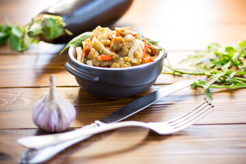 eggplant fried sauteed with other vegetables in a plate