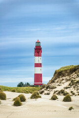Fototapeta na wymiar Leuchtturm in Wittdün auf der Nordseeinsel Amrum