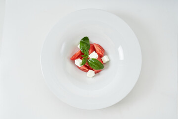 light salad with tomatoes and cheese