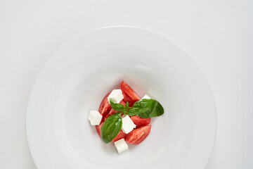 light salad with tomatoes and cheese