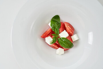 light salad with tomatoes and cheese