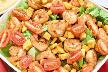 Prawns. Shrimp and fresh vegetable salad, arugula leaves, lettuce. Healthy bowls of salad with grilled shrimp. Healthy food background for recipe, menu.