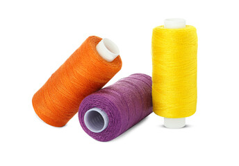 Different colorful sewing threads on white background