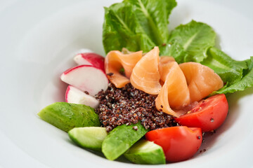 appetizer with red fish and vegetables