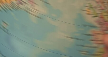 Rotating globe terraqueo map that stops at the destination of Spain, Madrid.