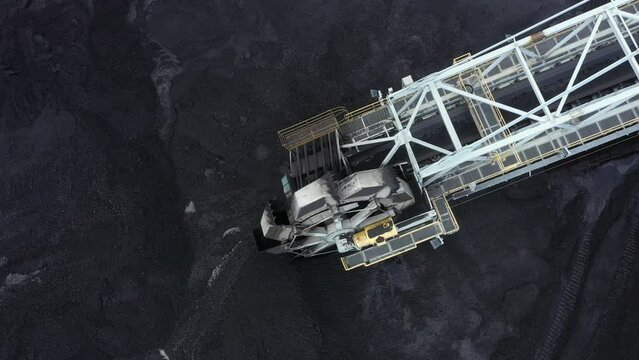 Coal terminal with technics working in it.