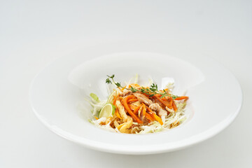 salad with vegetables and fruits. cabbage, markov, apple, lemon. dressing olive oil with lemon and mustard