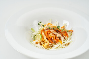 salad with vegetables and fruits. cabbage, markov, apple, lemon. dressing olive oil with lemon and mustard