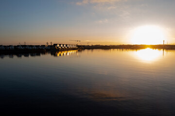 Obraz premium sunset over the river