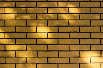 Yellow brick wall for background or texture