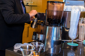 Coffee day shot and coffee maker, Photo is selective focus with shallow depth of field. Taken at Cairo Egypt on 28 September 2017.