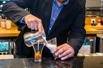 Coffee day shot and coffee maker, Photo is selective focus with shallow depth of field. Taken at Cairo Egypt on 28 September 2017.
