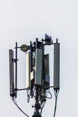 radio antenna on the roof of building against sky background