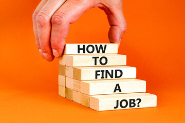 How to find a job symbol. Concept words How to find a job on wooden blocks on a beautiful orange table orange background. Businessman hand. Business and how to find a job concept. Copy space.