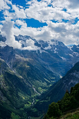 Fototapeta premium Alpine landscape, a famous valley in Switzerland. Lauterbrunnen valley 72 waterfalls, the place that was inspired by Tolkien
