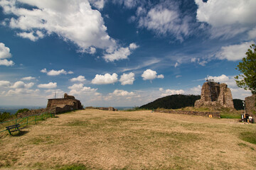 Ruins of Lichnice castle in summer cloudy day. Czech Republic.