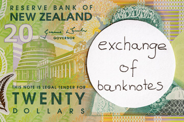 New Zealand, change of money with the image of the queen, 20 New Zealand dollars, manual inscription on the image of exchange of money, close Up, Financial business concept in commonwealth countries,