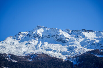 Fototapeta na wymiar Alps, snow covered mountains