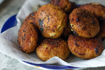 fried cutlets in a plate, close-up