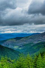 View. of the mountain ridge of northern cascades and Snoqualmie pass from Mt, Rainer national park with storm clouds