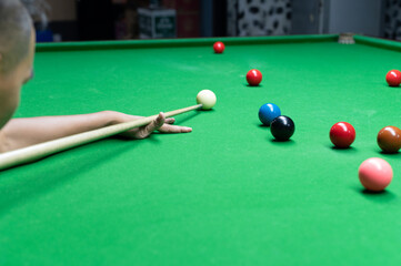 person playing snooker