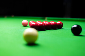 snooker ball on the green snooker table at snooker club.