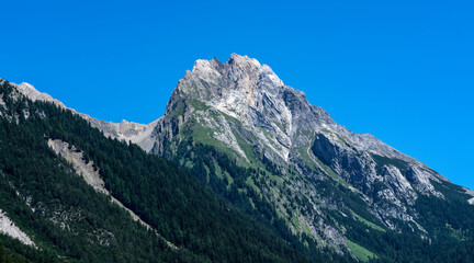 Fototapeta na wymiar big Alpine mountains against the sky