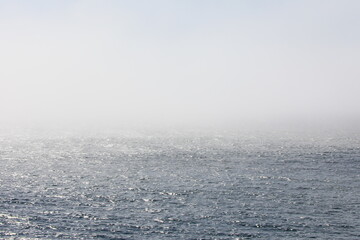 Thick fog on the water surface 