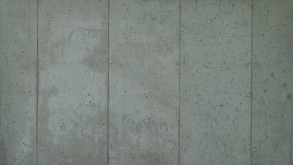 Wall background with a texture of gray concrete