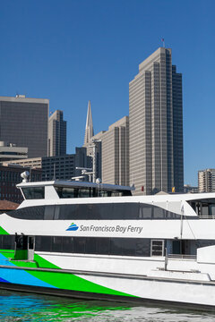 San Francisco Ferry with Embarcadero Towers and Transamerica Towers in the background