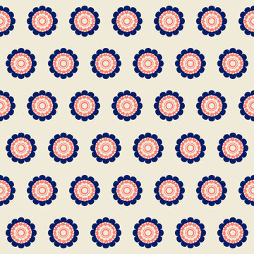 Seamless Pattern Of Pink And Dark Blue Flowers On A Pale Background