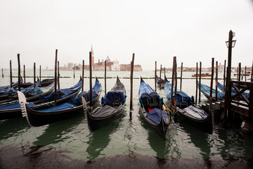 Fototapeta premium Gondolas parking in the traditional Venetian rowing boat