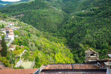 Green mountains panorama taken from the village of Apricale (Imperia Province, Liguria Region, Northern Italy). Old medieval town, is located above the Maritime Alps, near the Italy-French borders.