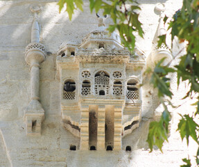 Original Ottoman Bird House These kinds bird houses are called by bird palaces for pigeons and city birds. This is on the Yeni Valide Mosque`s exterior wall in Uskudar, Istanbul, Turkey.